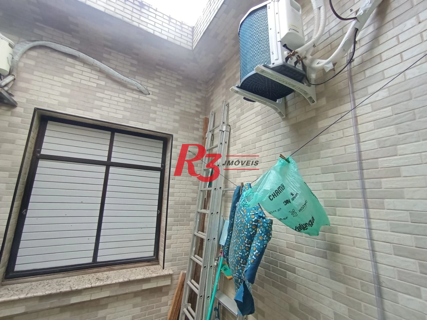 Sobrado com 3 dormitórios à venda, 185 m² por R$ 1.500.000,00 - José Menino - Santos/SP