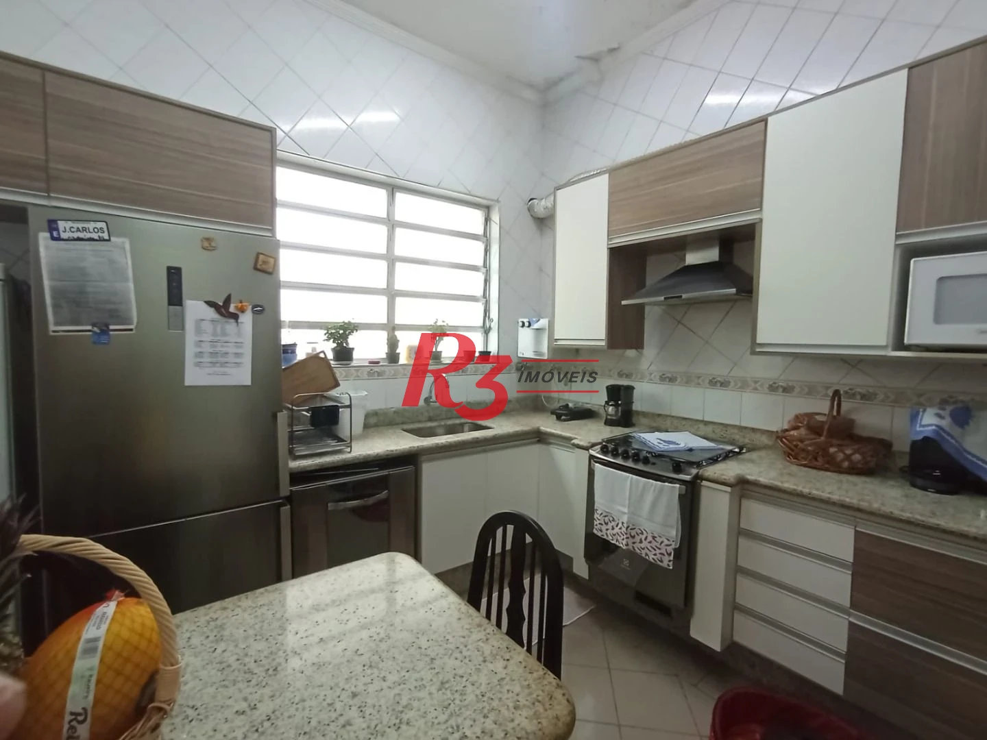 Sobrado com 3 dormitórios à venda, 185 m² por R$ 1.500.000,00 - José Menino - Santos/SP