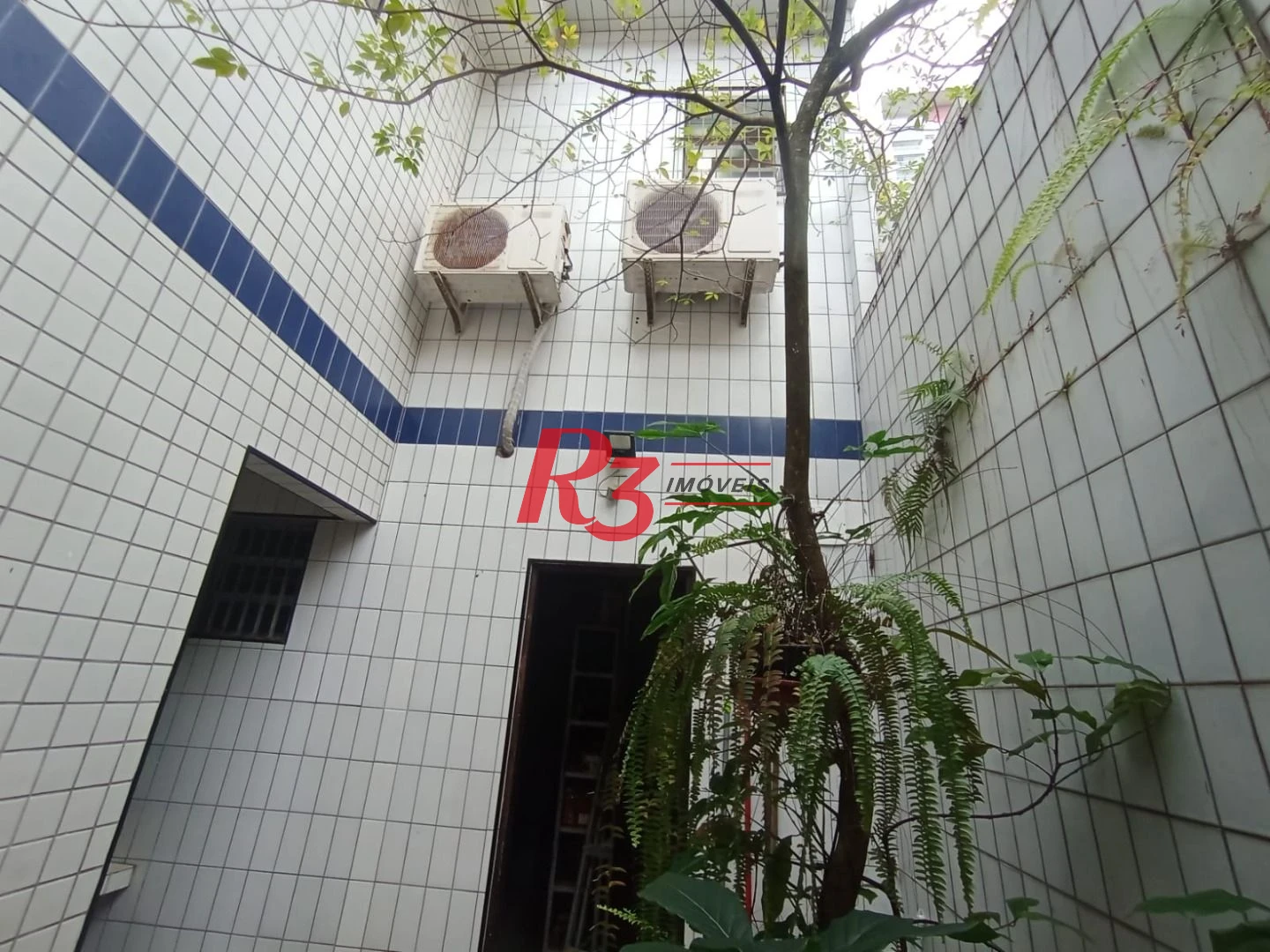 Sobrado com 3 dormitórios à venda, 185 m² por R$ 1.500.000,00 - José Menino - Santos/SP