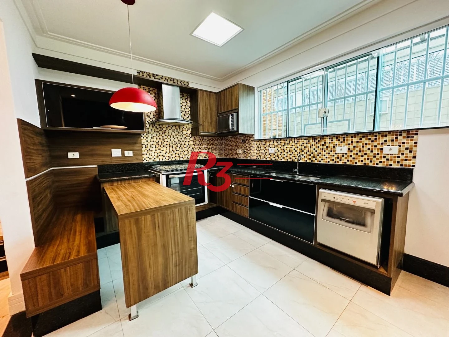 Casa com 3 dormitórios à venda, 210 m² por R$ 1.234.000,00 - Vila Matias - Santos/SP