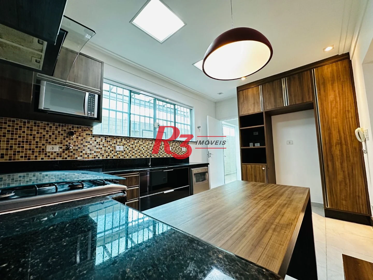 Casa com 3 dormitórios à venda, 210 m² por R$ 1.234.000,00 - Vila Matias - Santos/SP
