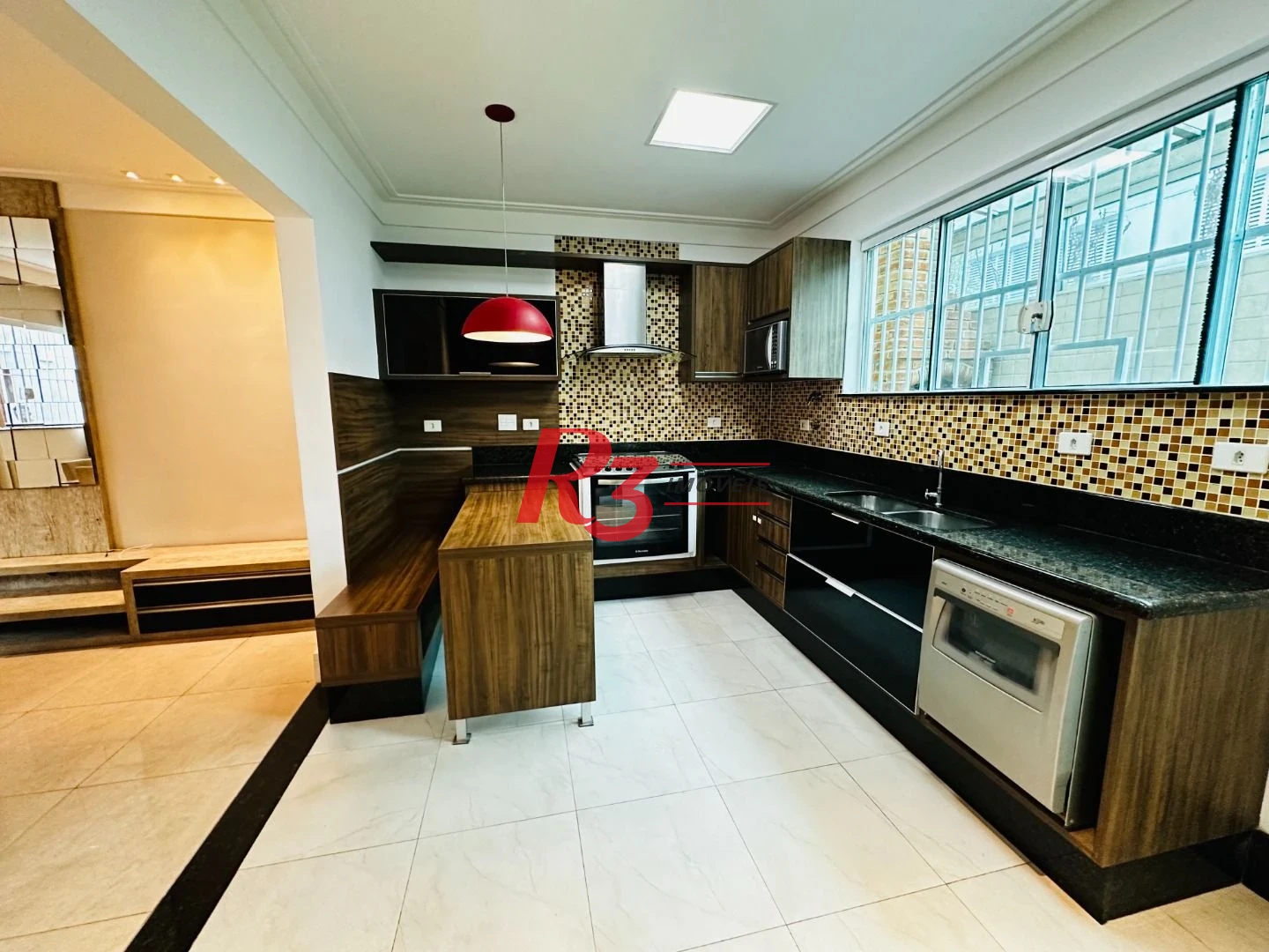 Casa com 3 dormitórios à venda, 210 m² por R$ 1.234.000,00 - Vila Matias - Santos/SP