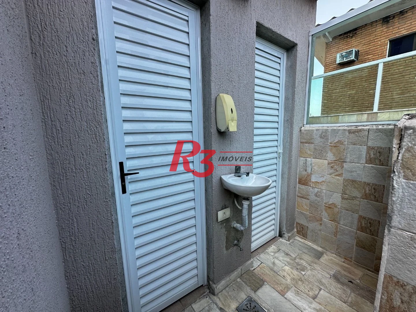 Casa com 3 dormitórios à venda, 210 m² por R$ 1.234.000,00 - Vila Matias - Santos/SP