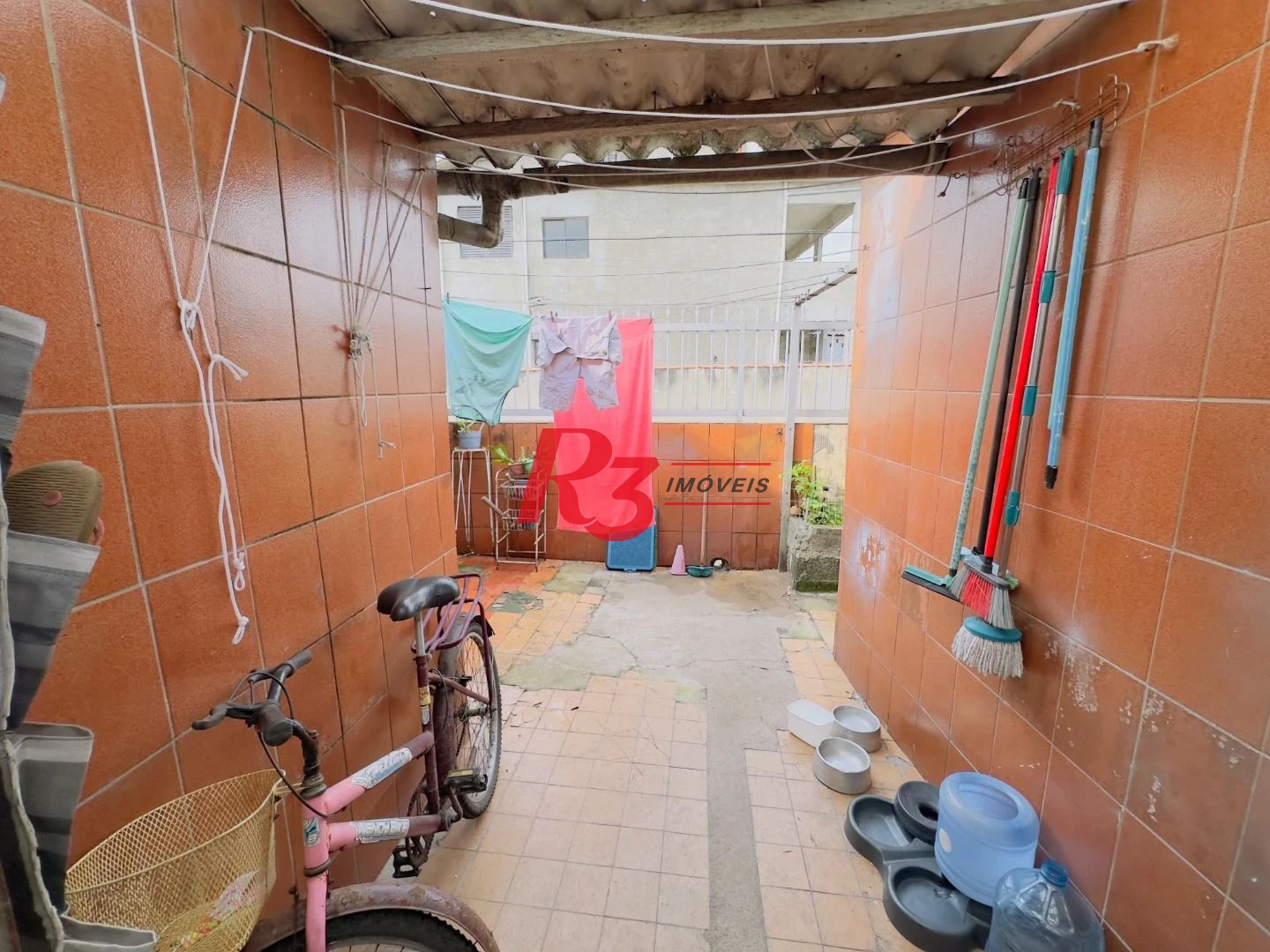 Casa à venda, 153 m² por R$ 470.000,00 - Areia Branca - Santos/SP