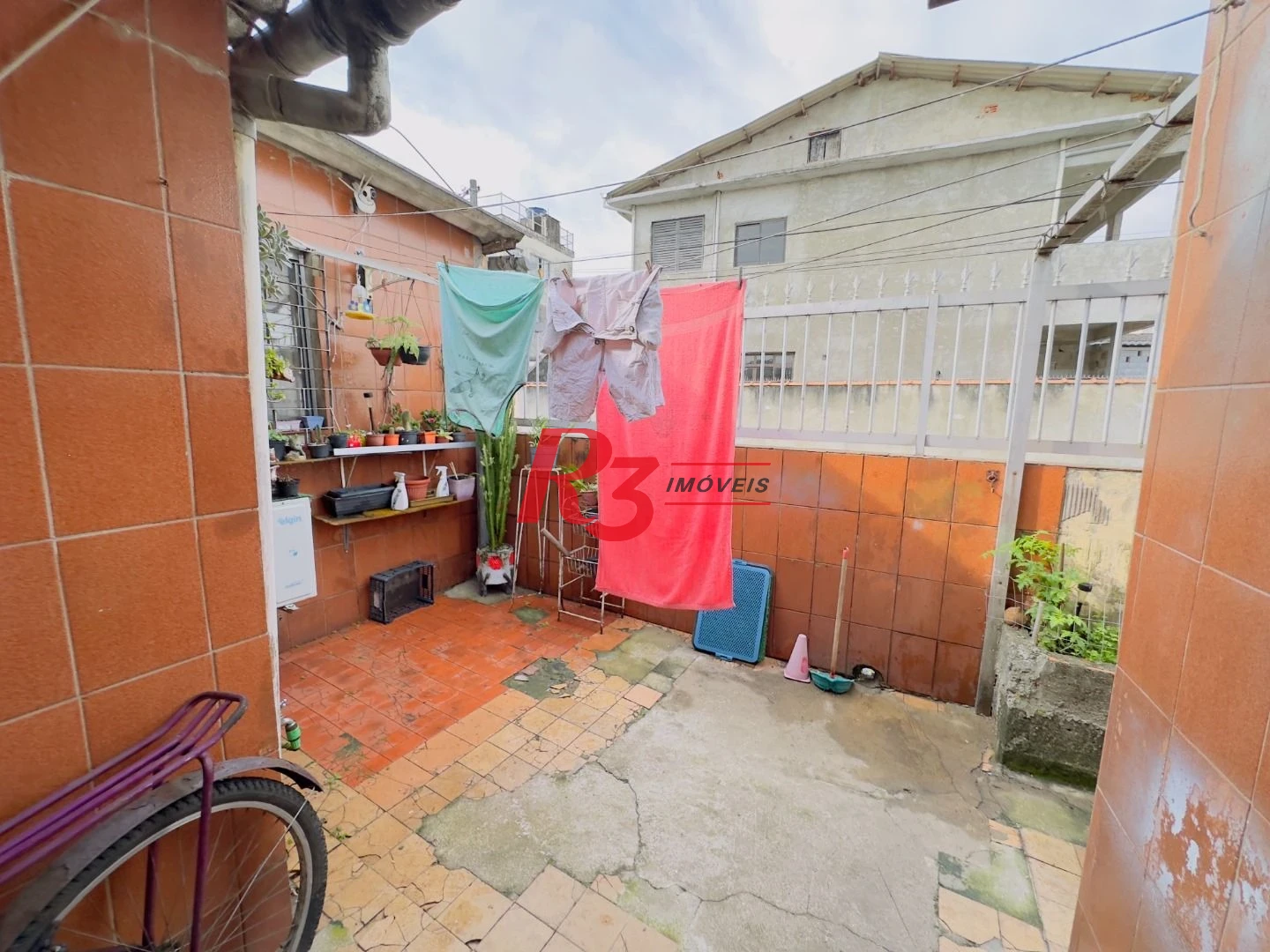 Casa à venda, 153 m² por R$ 470.000,00 - Areia Branca - Santos/SP
