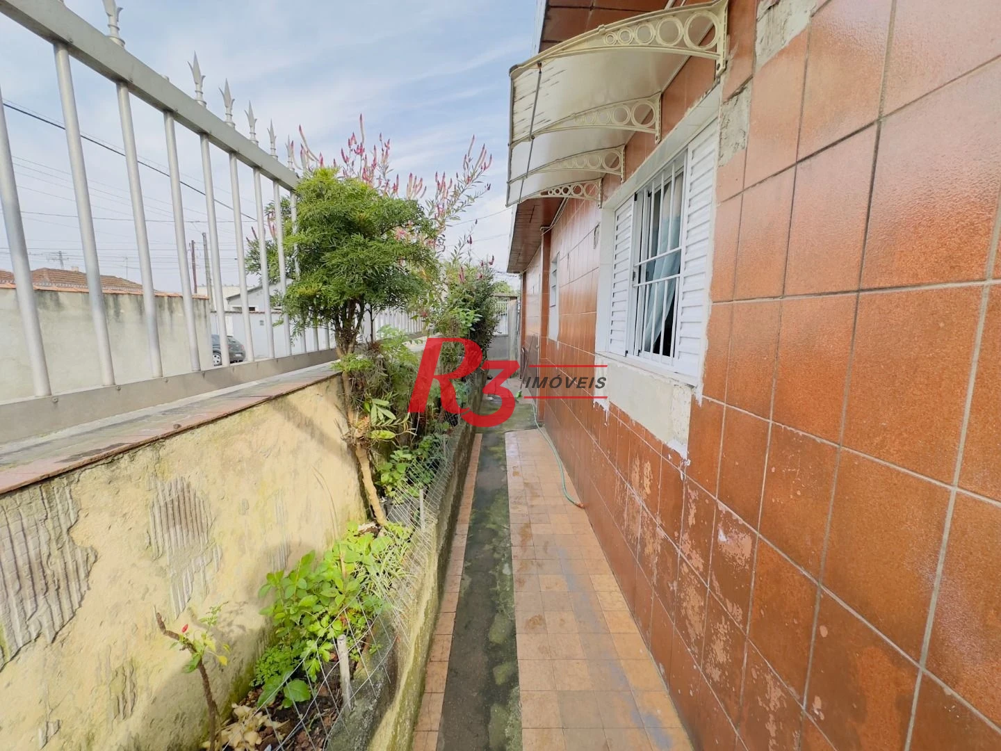 Casa à venda, 153 m² por R$ 470.000,00 - Areia Branca - Santos/SP