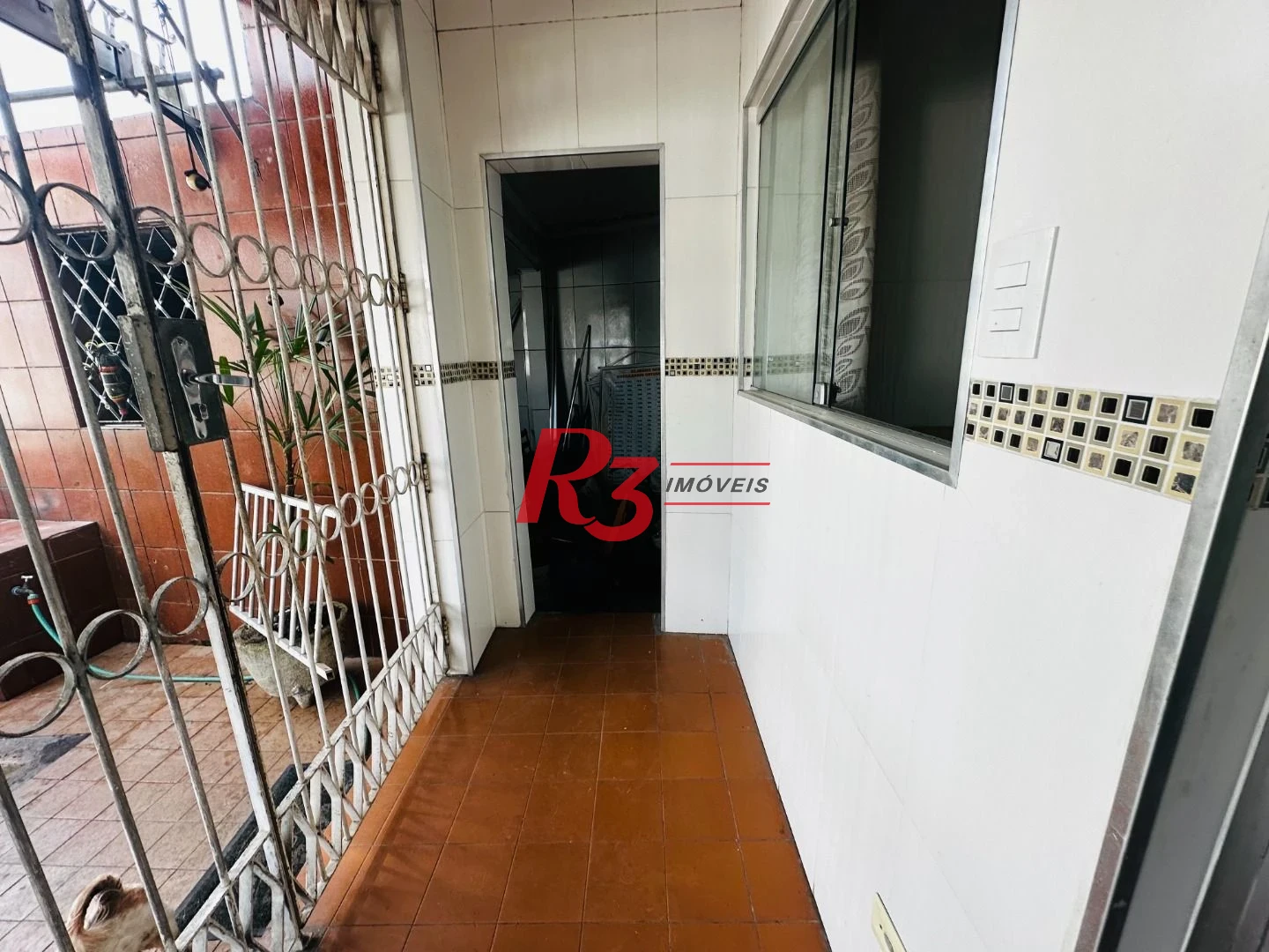 Casa à venda, 153 m² por R$ 470.000,00 - Areia Branca - Santos/SP