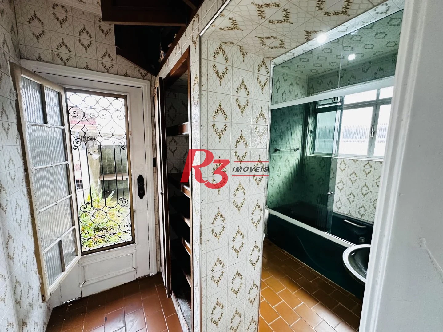 Sobrado com 3 dormitórios à venda, 248 m² por R$ 1.200.000,00 - Vila Belmiro - Santos/SP