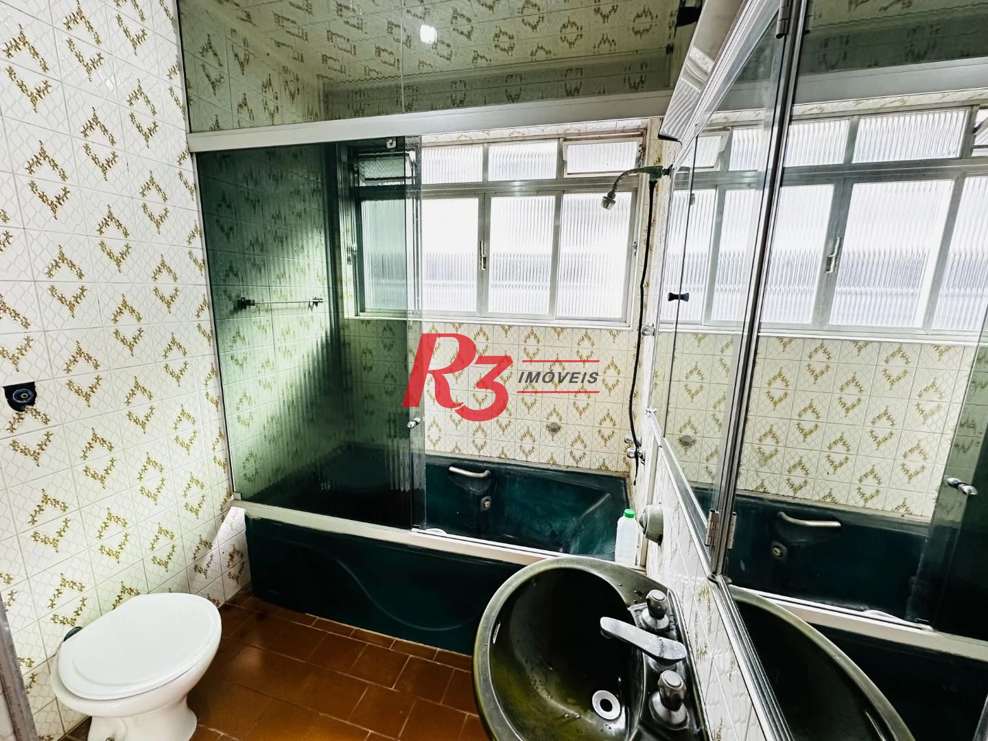 Sobrado com 3 dormitórios à venda, 248 m² por R$ 1.200.000,00 - Vila Belmiro - Santos/SP