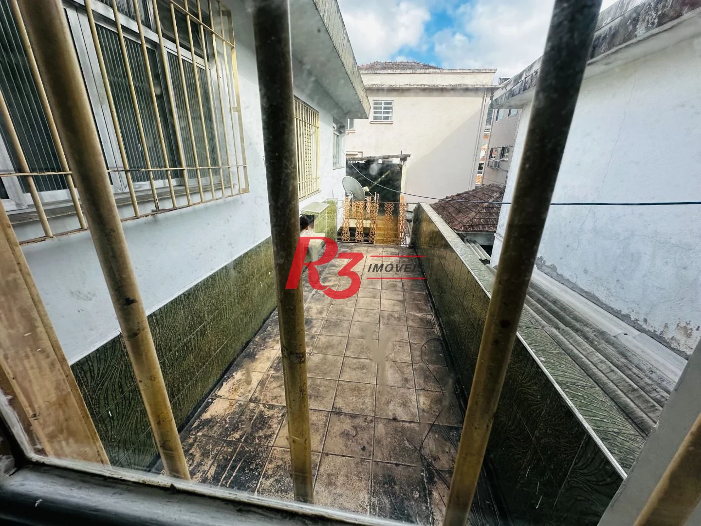 Sobrado com 3 dormitórios à venda, 248 m² por R$ 1.200.000,00 - Vila Belmiro - Santos/SP