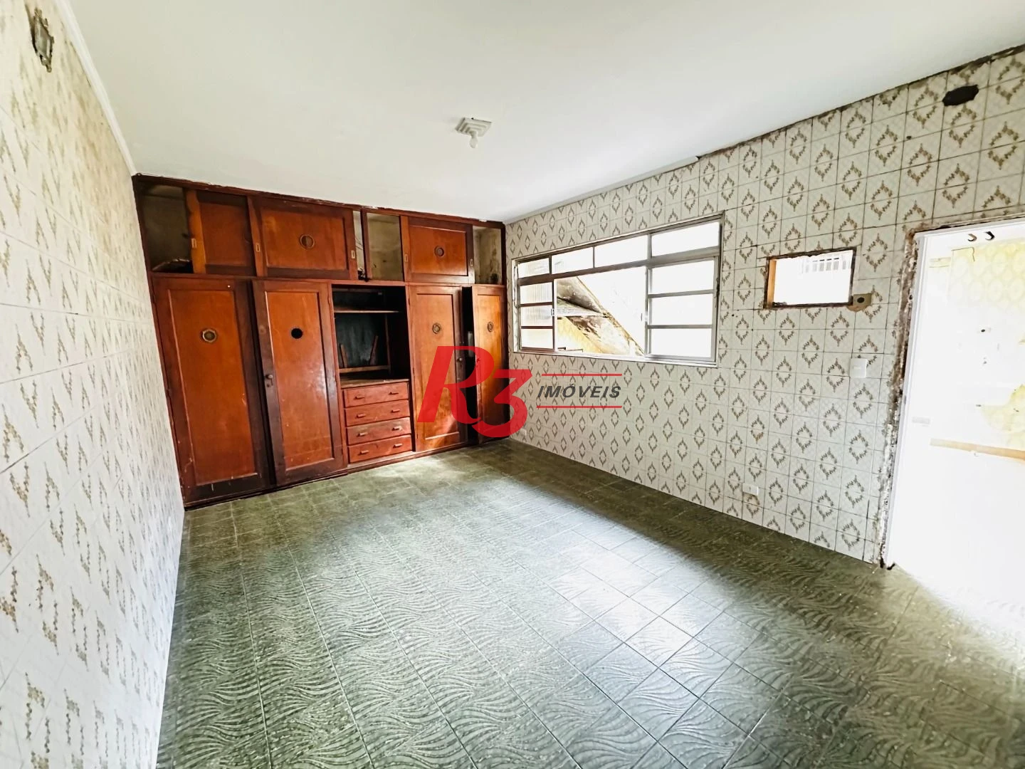 Sobrado com 3 dormitórios à venda, 248 m² por R$ 1.200.000,00 - Vila Belmiro - Santos/SP