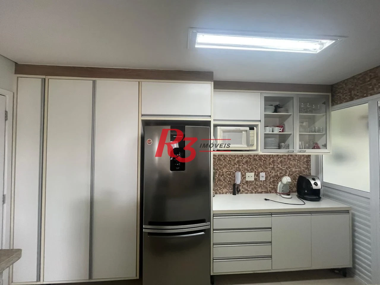 Apartamento com 3 dormitórios à venda, 98 m² por R$ 740.000,00 - Vila Santo Antônio - Guarujá/SP