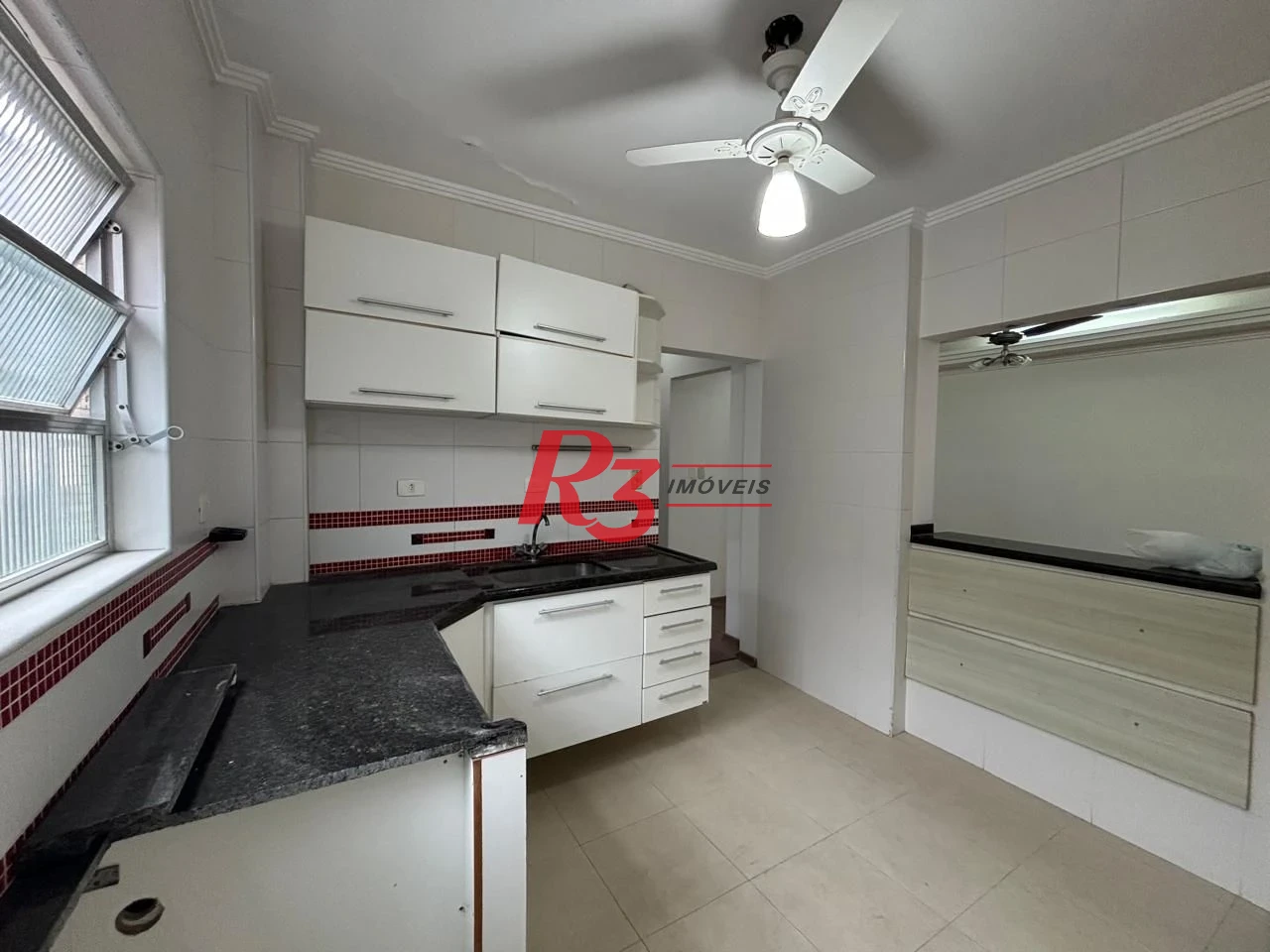 Apartamento com 2 dormitórios à venda, 90 m² por R$ 600.000,00 - Gonzaga - Santos/SP