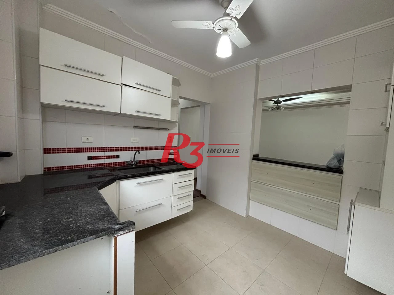 Apartamento com 2 dormitórios à venda, 90 m² por R$ 600.000,00 - Gonzaga - Santos/SP