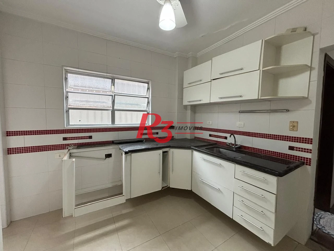 Apartamento com 2 dormitórios à venda, 90 m² por R$ 600.000,00 - Gonzaga - Santos/SP