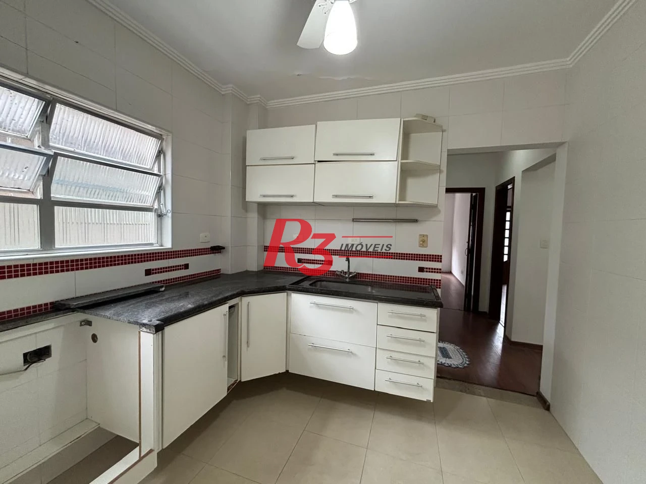 Apartamento com 2 dormitórios à venda, 90 m² por R$ 600.000,00 - Gonzaga - Santos/SP