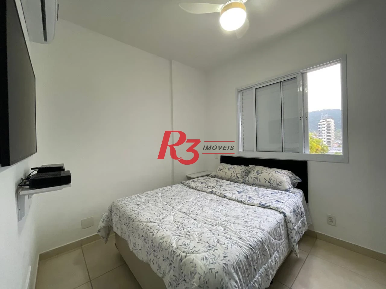 Apartamento com 3 dormitórios à venda, 84 m² por R$ 800.000,00 - Jardim Praiano - Guarujá/SP