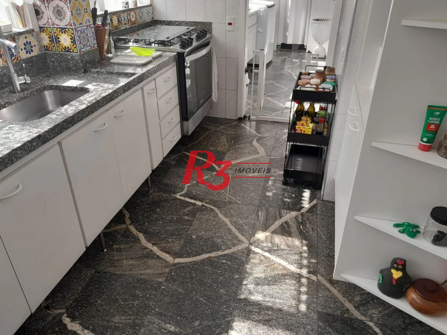 Apartamento com 4 dormitórios à venda, 376 m² por R$ 1.500.000,00 - Praia das Pitangueiras Beira Mar - Guarujá/SP