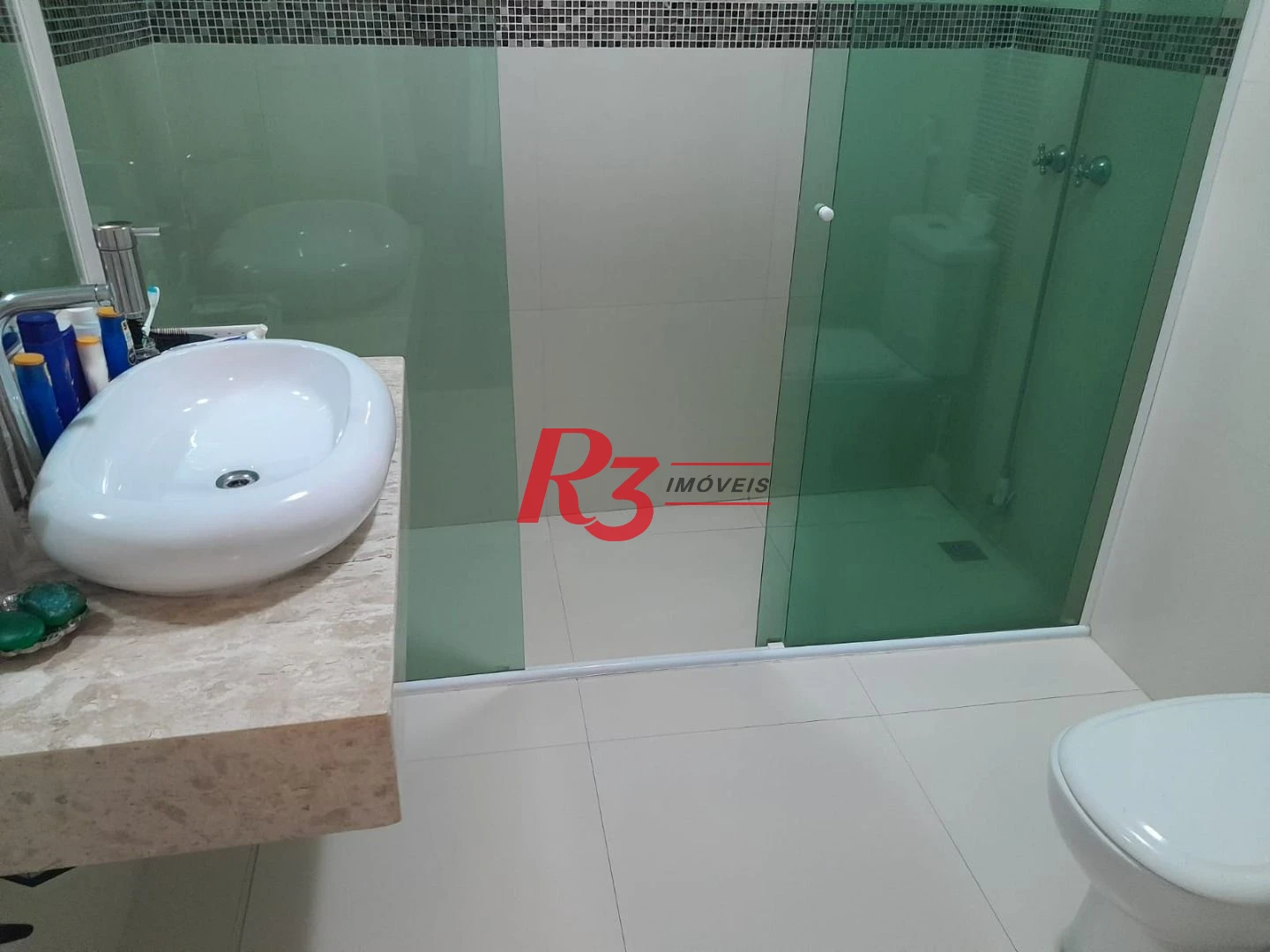 Apartamento com 4 dormitórios à venda, 376 m² por R$ 1.500.000,00 - Praia das Pitangueiras Beira Mar - Guarujá/SP