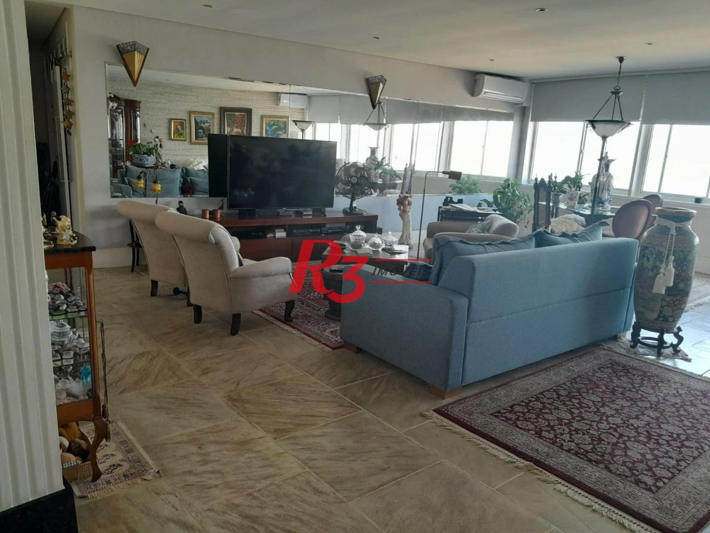 Apartamento com 4 dormitórios à venda, 376 m² por R$ 1.500.000,00 - Praia das Pitangueiras Beira Mar - Guarujá/SP