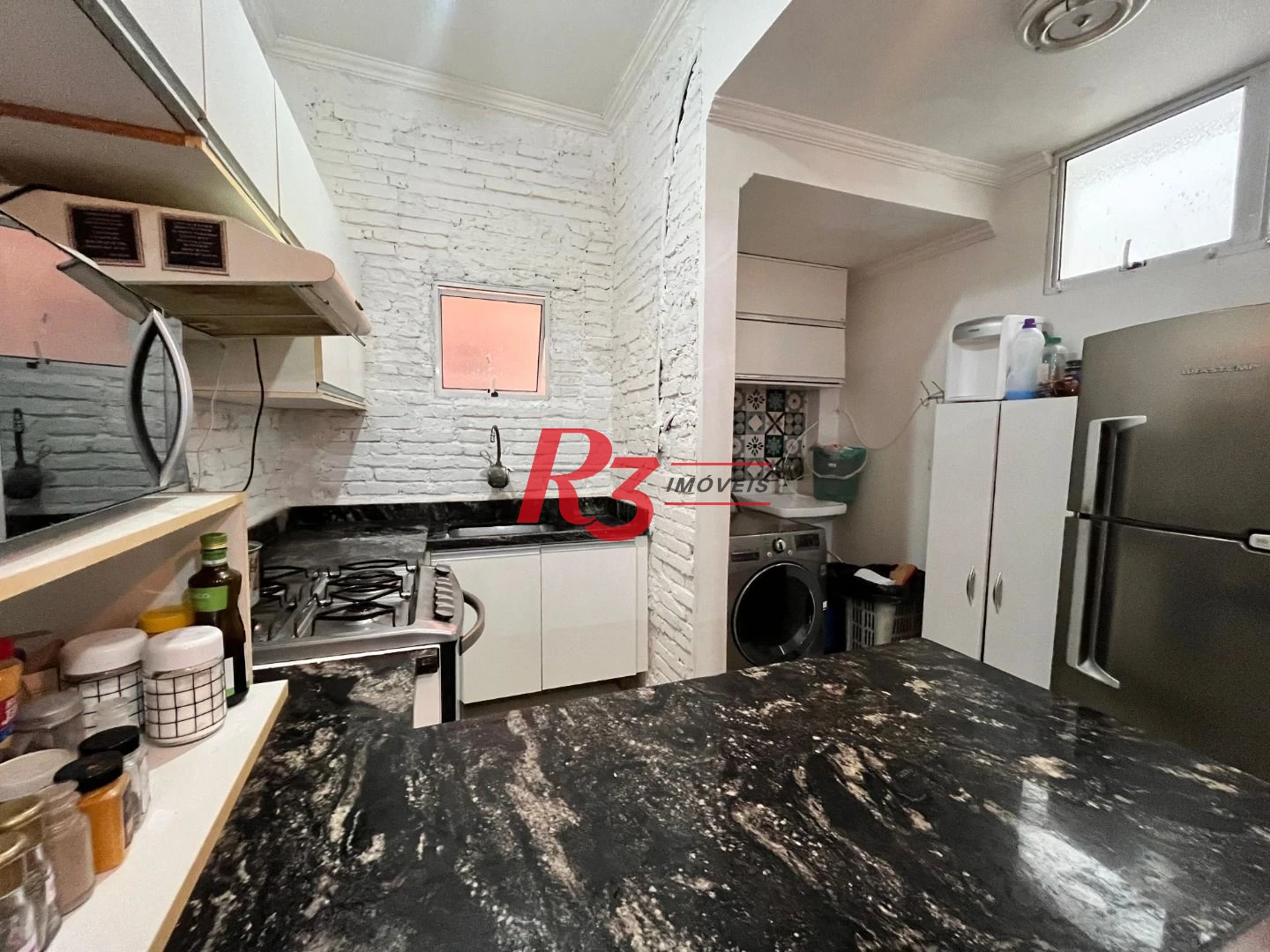 Apartamento com 2 dormitórios à venda, 87 m² por R$ 440.000,00 - Gonzaga - Santos/SP