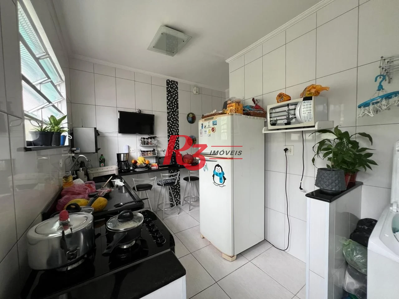 Casa com 2 dormitórios à venda, 78 m² por R$ 580.000,00 - Aparecida - Santos/SP