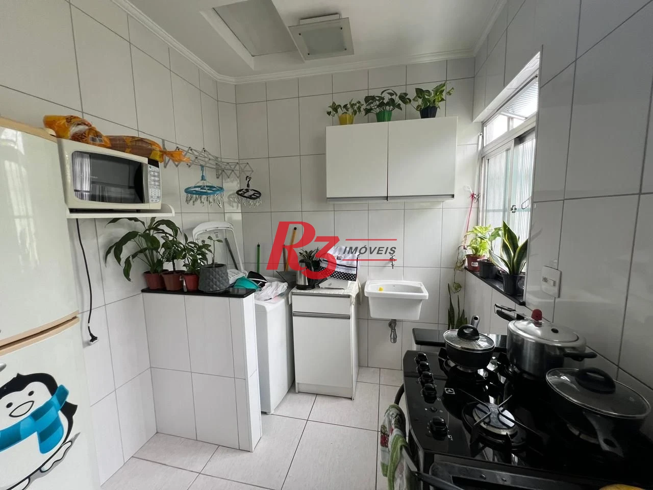 Casa com 2 dormitórios à venda, 78 m² por R$ 580.000,00 - Aparecida - Santos/SP