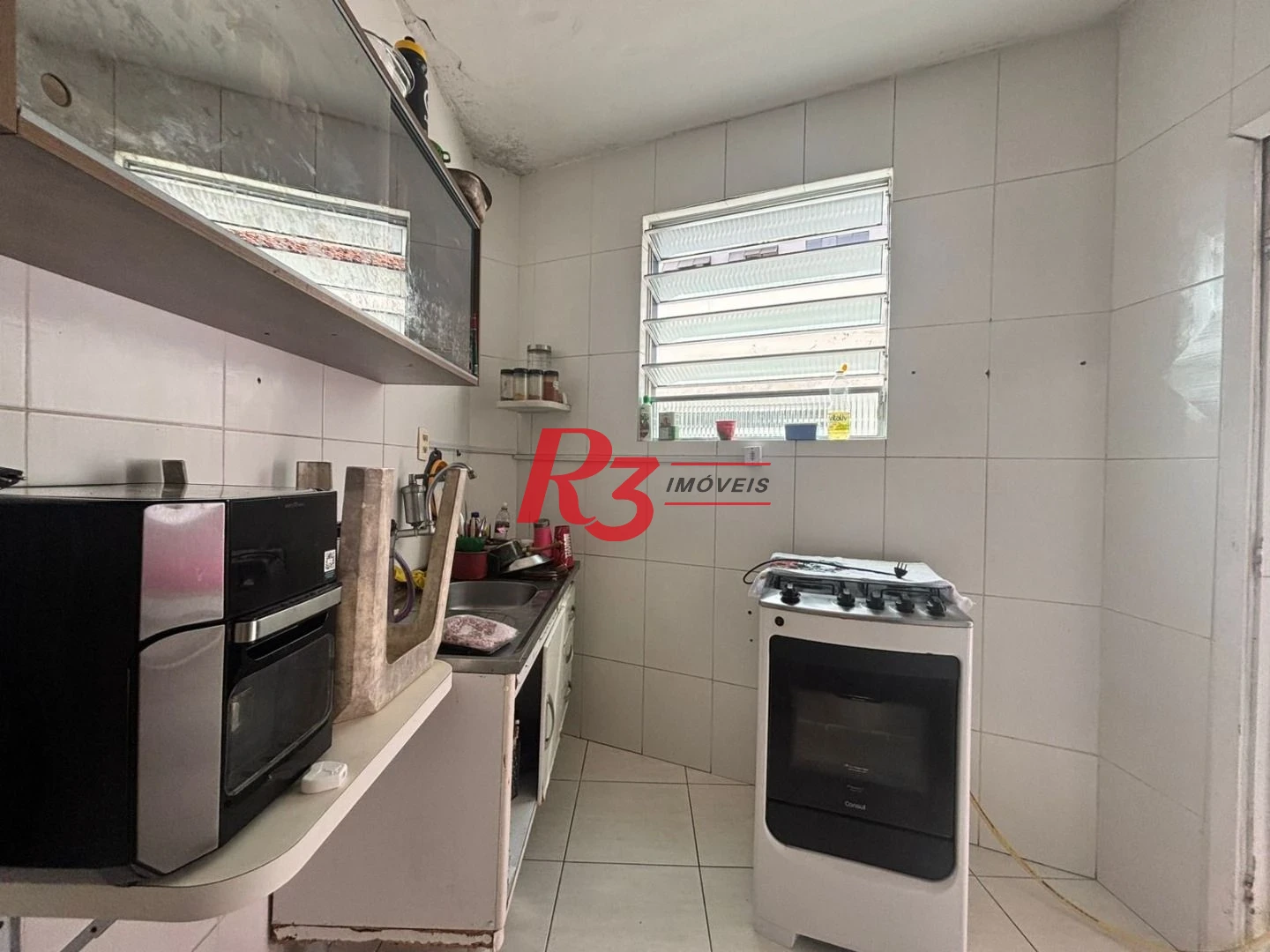 Apartamento com 2 dormitórios para alugar, 65 m² - Boqueirão - Santos/SP
