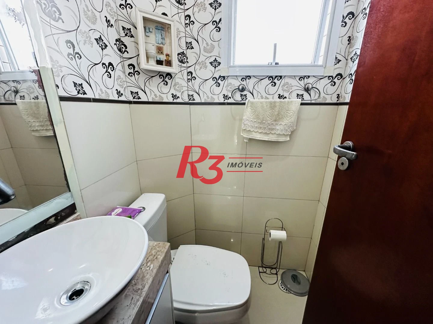 Casa com 3 dormitórios à venda, 210 m² por R$ 585.000,00 - Centro - São Vicente/SP