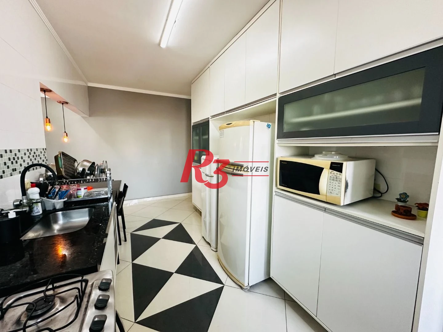 Casa com 3 dormitórios à venda, 210 m² por R$ 585.000,00 - Centro - São Vicente/SP