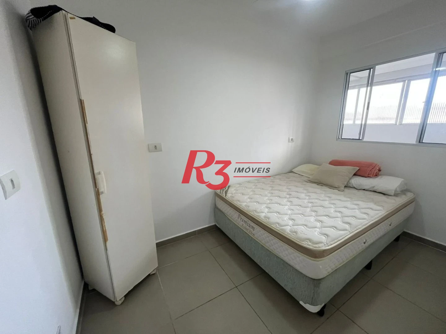 Apartamento com 3 dormitórios à venda, 103 m² por R$ 600.000,00 - Vila Alzira - Guarujá/SP