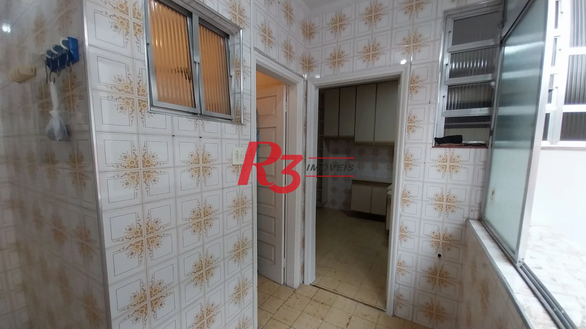 Casa com 3 dormitórios à venda, 142 m² por R$ 700.000,00 - Encruzilhada - Santos/SP