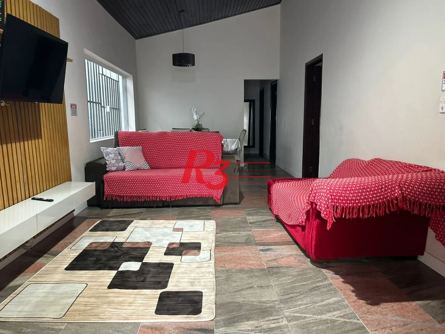 Casa com 4 dormitórios à venda, 139 m² por R$ 670.000,00 - Jardim Virginia - Guarujá/SP