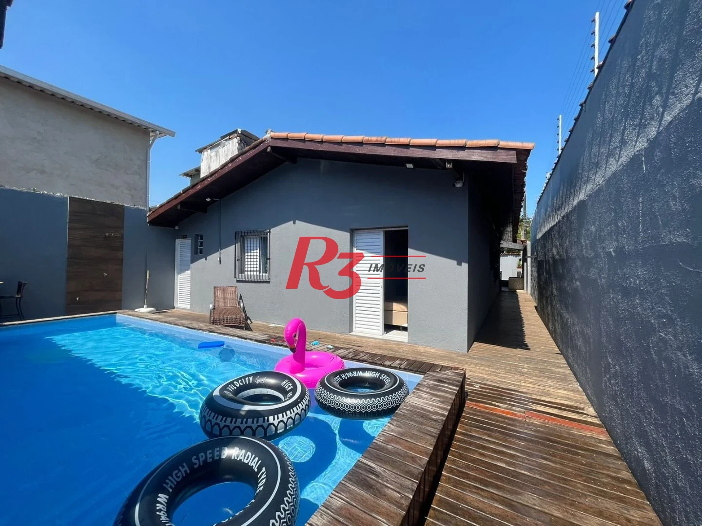 Casa com 4 dormitórios à venda, 139 m² por R$ 670.000,00 - Jardim Virginia - Guarujá/SP