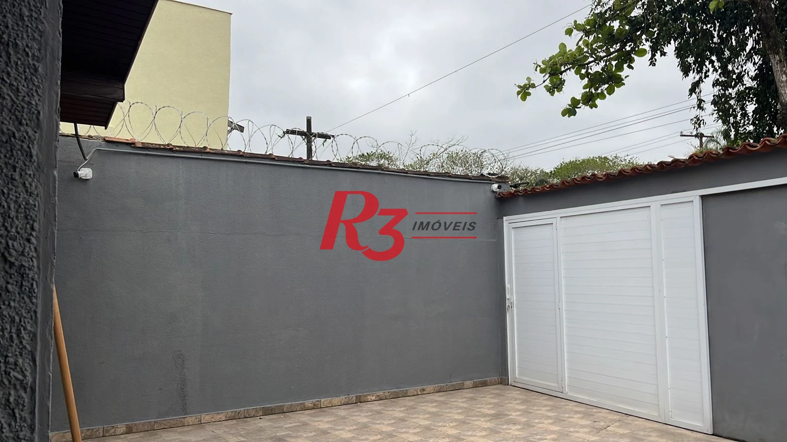 Casa com 4 dormitórios à venda, 139 m² por R$ 670.000,00 - Jardim Virginia - Guarujá/SP