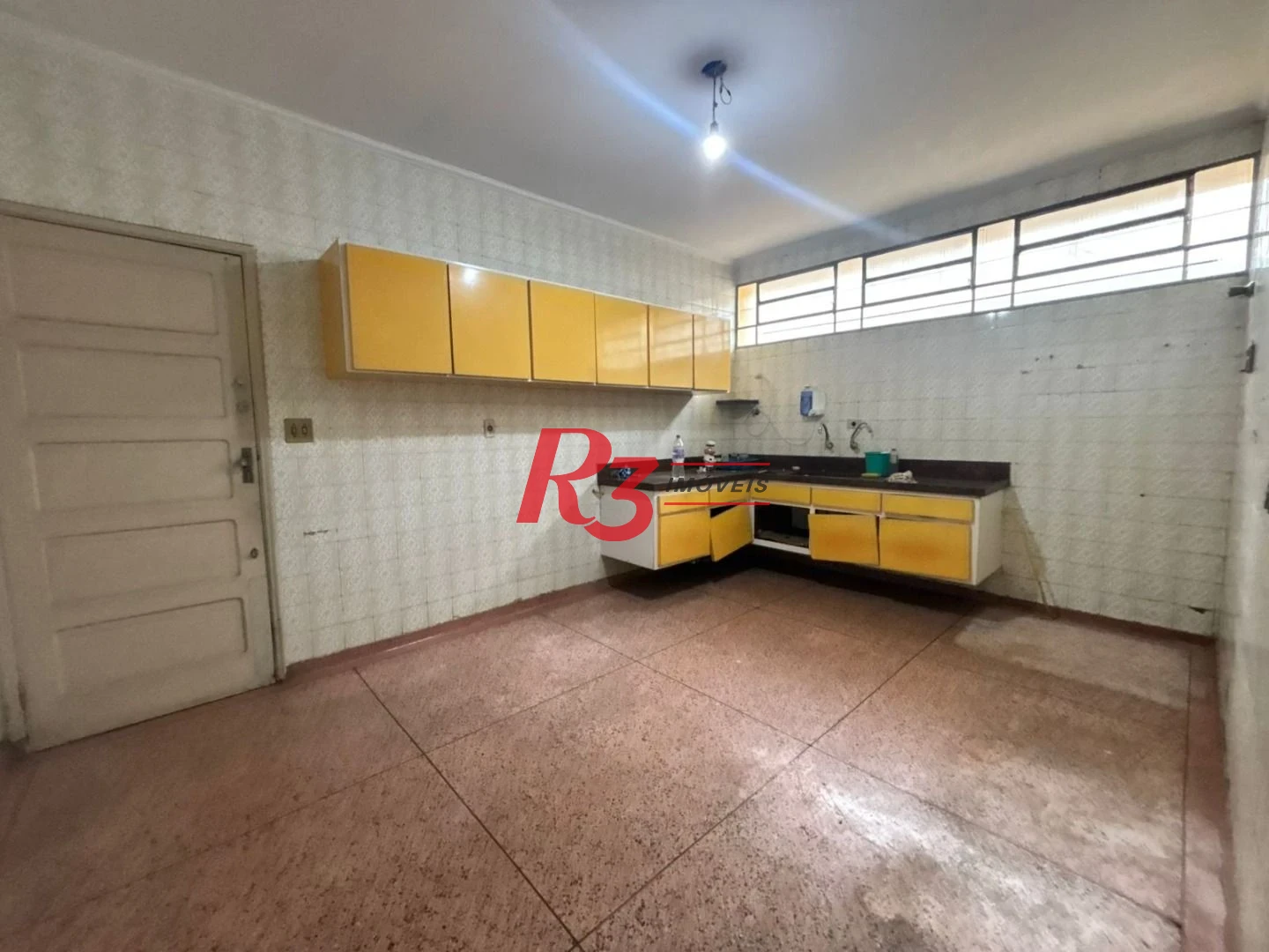 Sobrado com 3 dormitórios, 250 m² - venda por R$ 3.200.000,00 ou aluguel por R$ 24.300,01/mês - Encruzilhada - Santos/SP