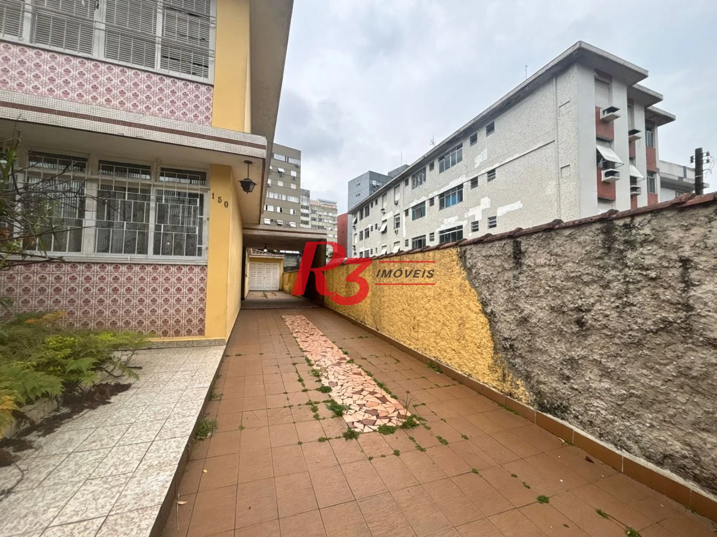 Sobrado com 3 dormitórios, 250 m² - venda por R$ 3.200.000,00 ou aluguel por R$ 24.300,01/mês - Encruzilhada - Santos/SP