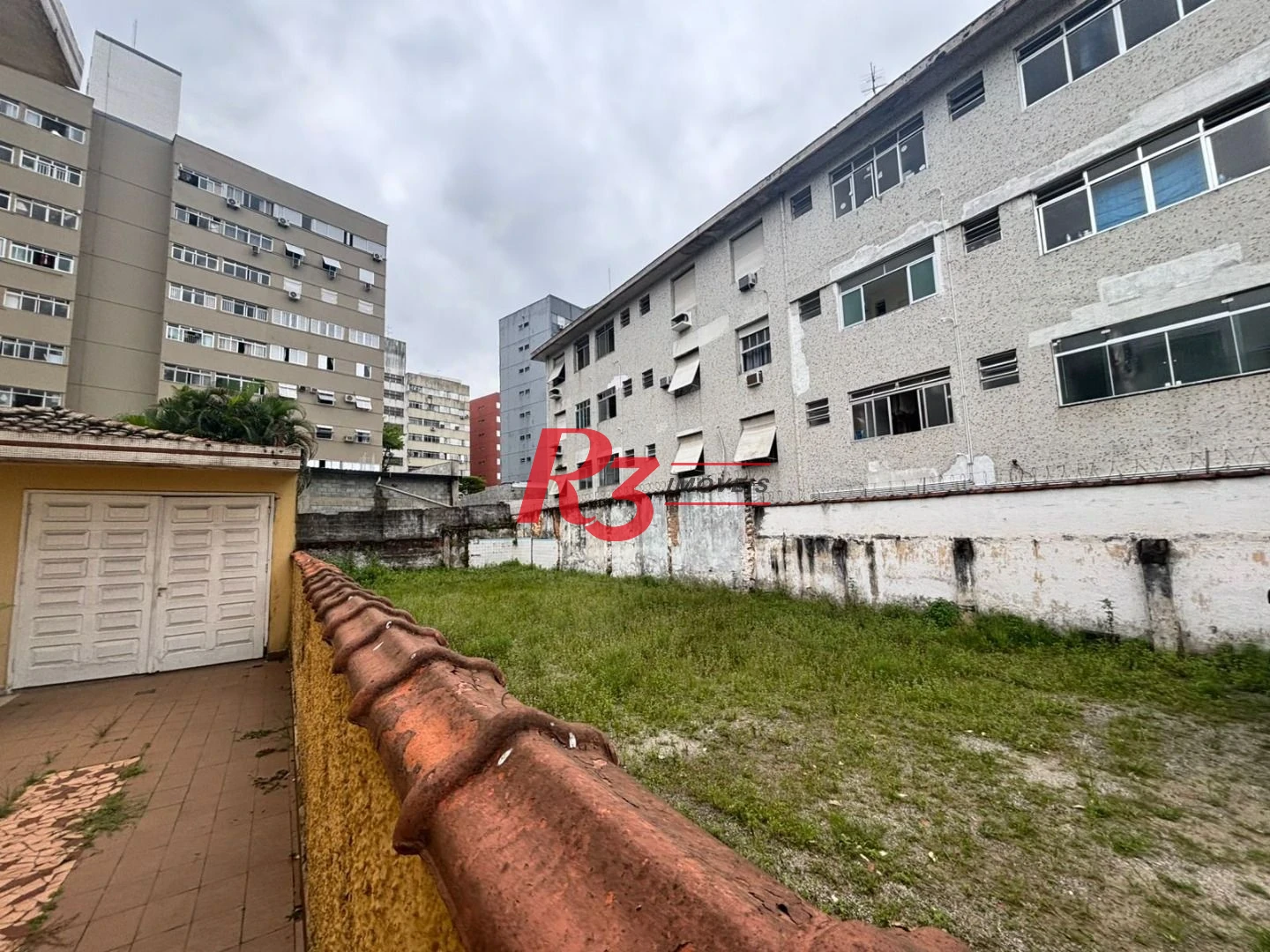 Sobrado com 3 dormitórios, 250 m² - venda por R$ 3.200.000,00 ou aluguel por R$ 24.300,01/mês - Encruzilhada - Santos/SP
