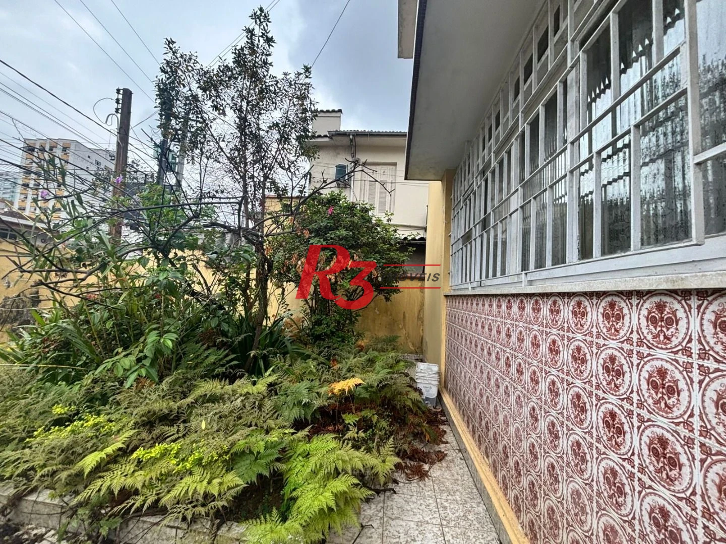 Sobrado com 3 dormitórios, 250 m² - venda por R$ 3.200.000,00 ou aluguel por R$ 24.300,01/mês - Encruzilhada - Santos/SP
