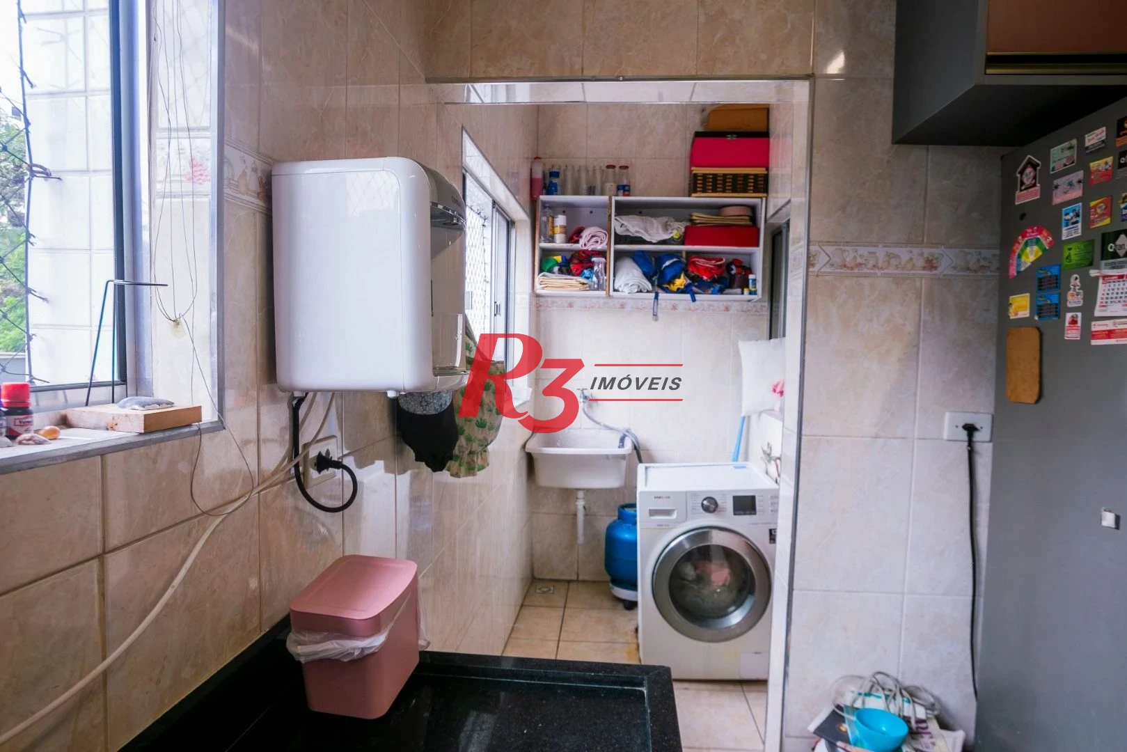 Casa com 3 dormitórios à venda, 320 m² por R$ 1.750.000,00 - Gonzaga - Santos/SP