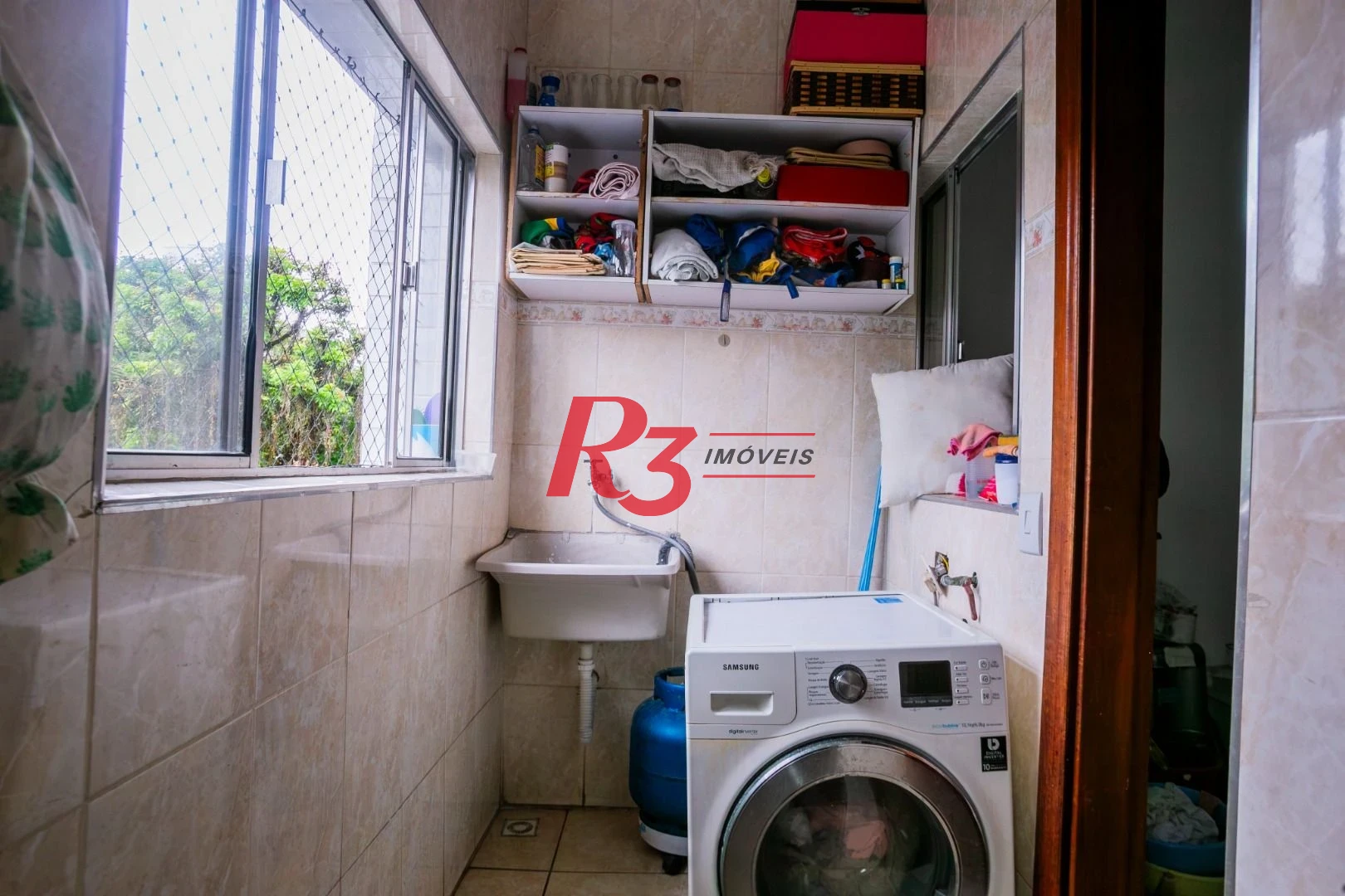 Casa com 3 dormitórios à venda, 320 m² por R$ 1.750.000,00 - Gonzaga - Santos/SP