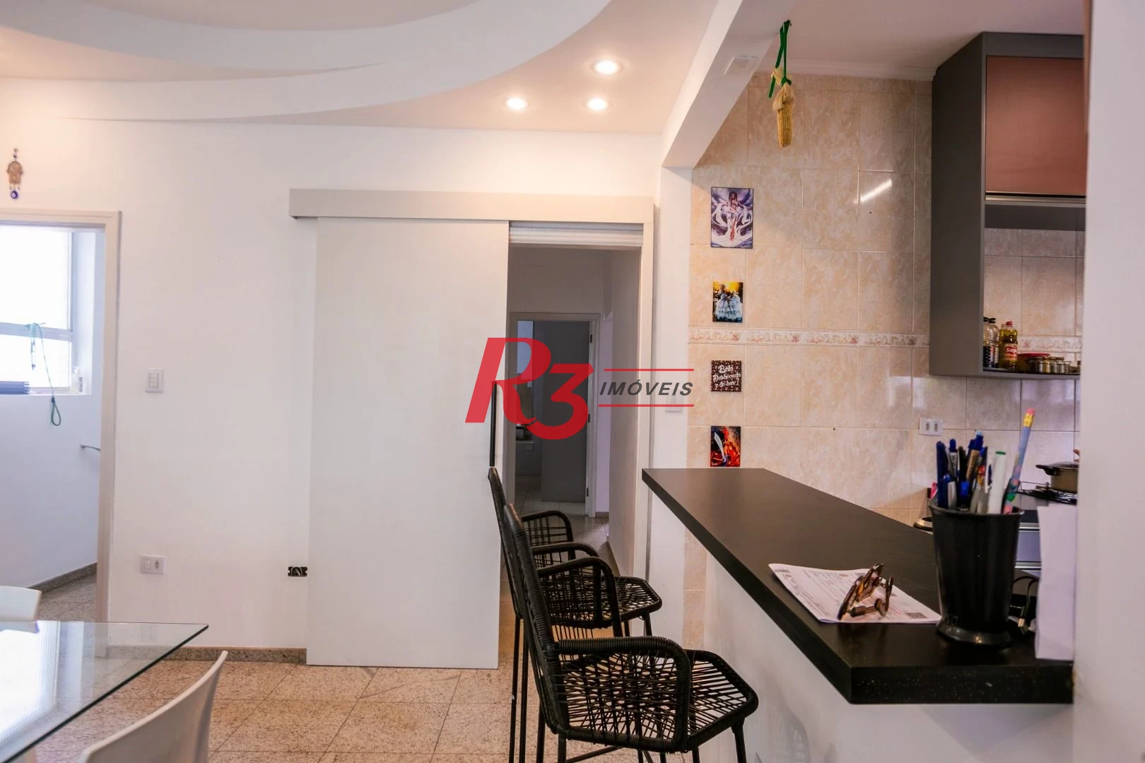 Casa com 3 dormitórios à venda, 320 m² por R$ 1.750.000,00 - Gonzaga - Santos/SP
