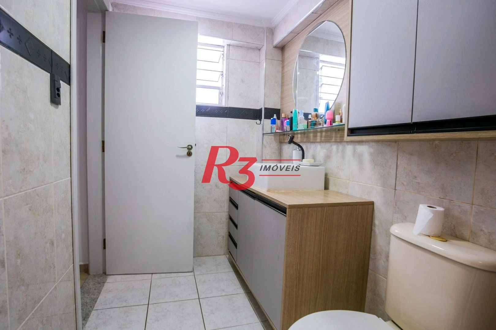 Casa com 3 dormitórios à venda, 320 m² por R$ 1.750.000,00 - Gonzaga - Santos/SP