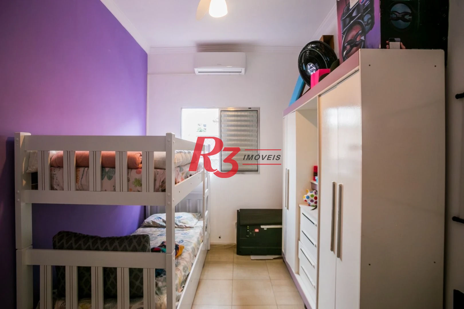 Casa com 3 dormitórios à venda, 320 m² por R$ 1.750.000,00 - Gonzaga - Santos/SP