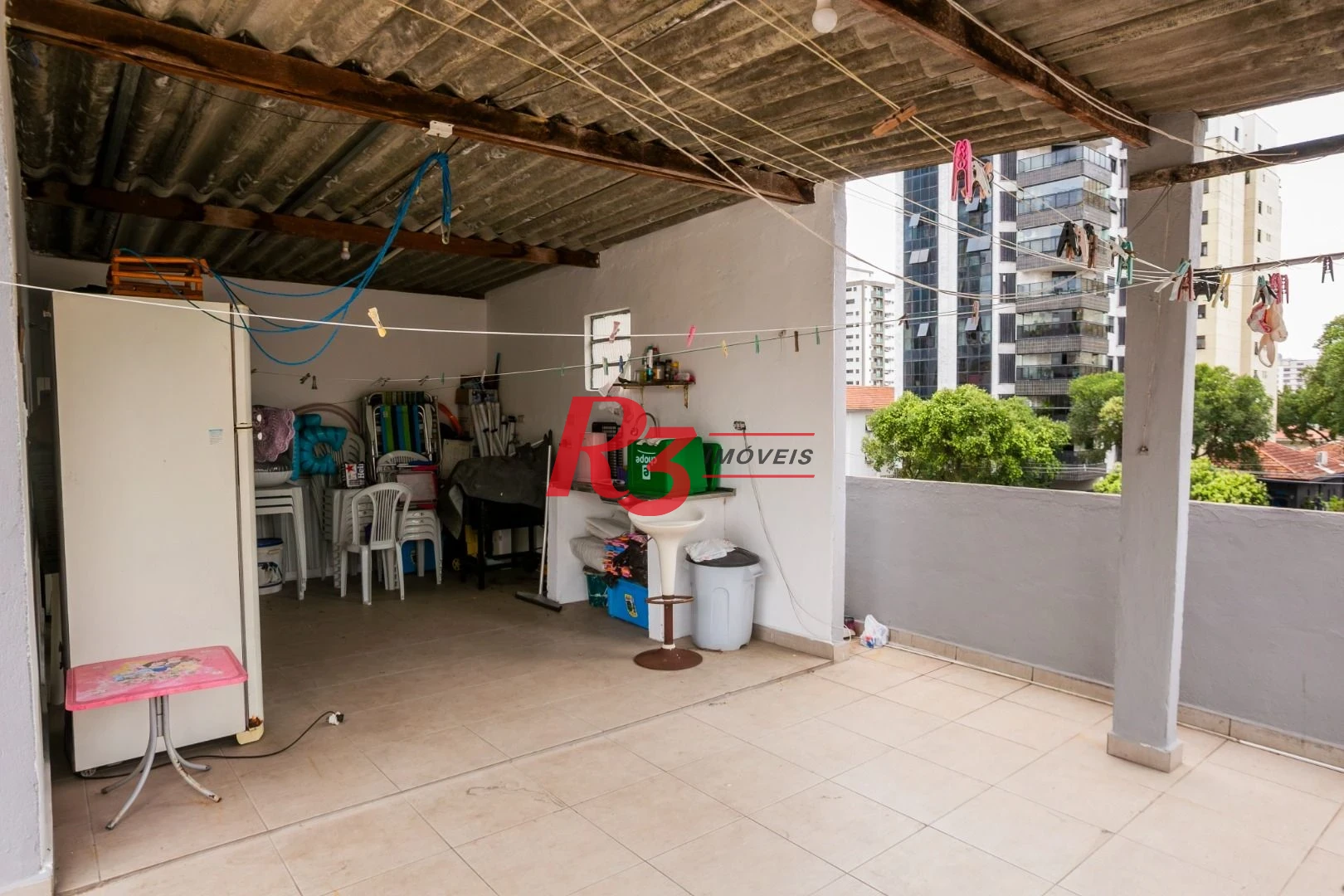 Casa com 3 dormitórios à venda, 320 m² por R$ 1.750.000,00 - Gonzaga - Santos/SP