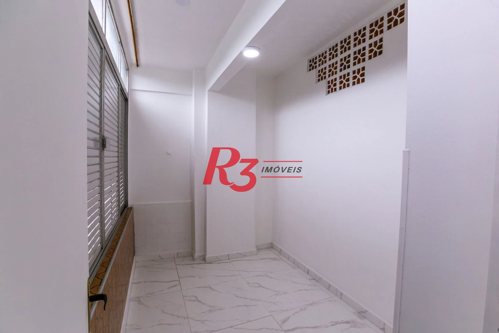 Apartamento com 2 dormitórios à venda, 65 m² por R$ 555.000,00 - José Menino - Santos/SP