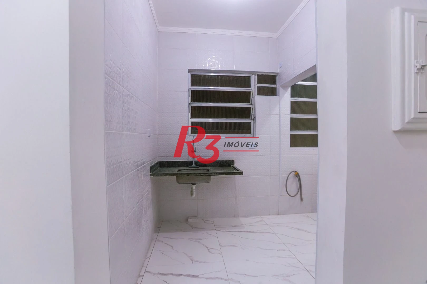 Apartamento com 2 dormitórios à venda, 65 m² por R$ 555.000,00 - José Menino - Santos/SP