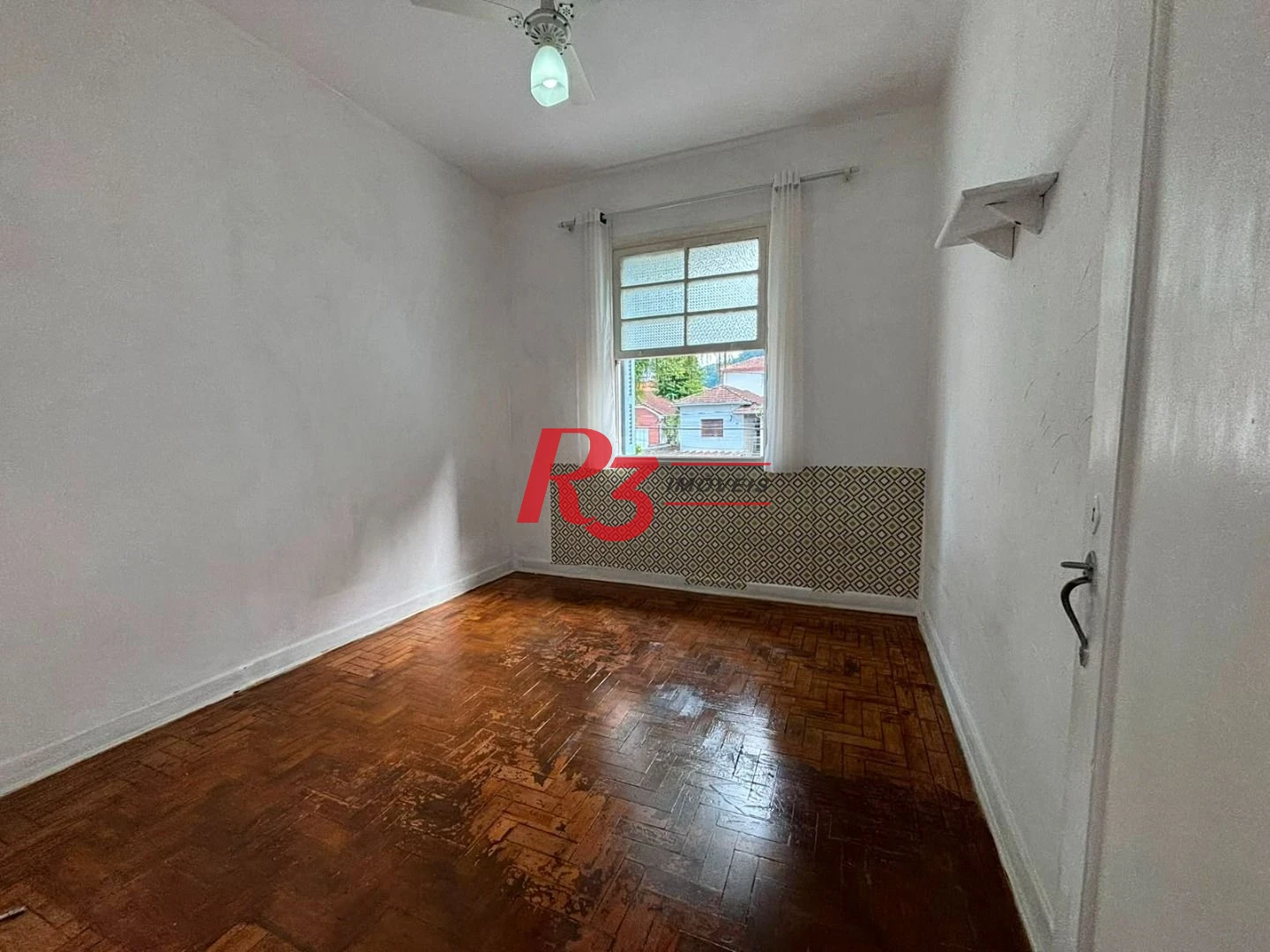 Sobrado com 3 dormitórios à venda, 140 m² por R$ 879.000,00 - Marapé - Santos/SP
