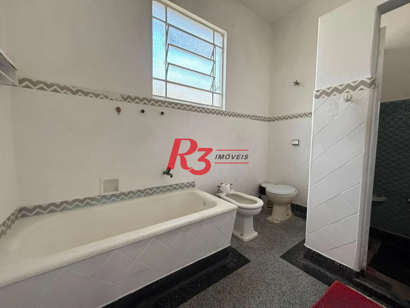 Sobrado com 3 dormitórios à venda, 140 m² por R$ 879.000,00 - Marapé - Santos/SP