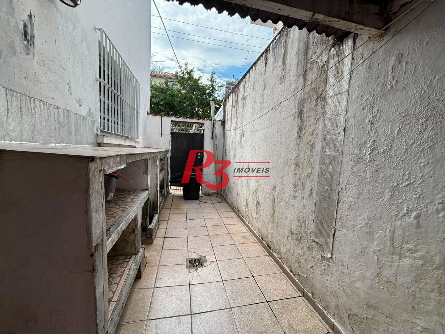 Sobrado com 3 dormitórios à venda, 140 m² por R$ 879.000,00 - Marapé - Santos/SP